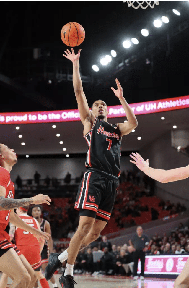Milos Uzan's floater as Houston basketball plays Arizona (Photo credit: Houston Athletics Stephen Pinchback)